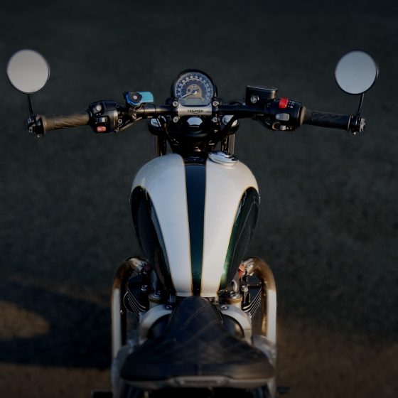 Overhead view of a Triumph Bobber showing the tank, handlebars and seat